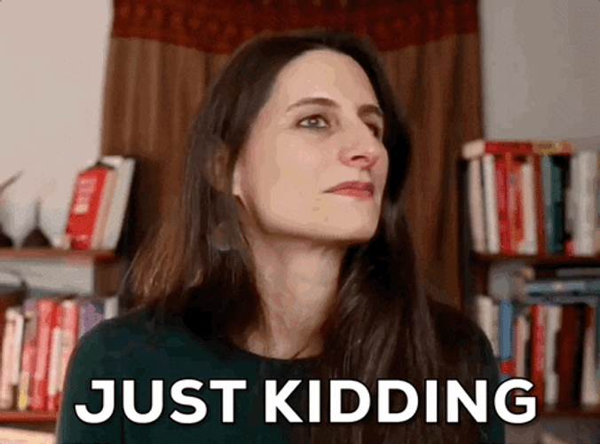 Girl Serious And Then She Say Just Kidding GIF