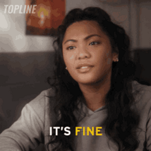 Girl Shaking Head Says Its Fine GIF
