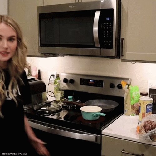 Girl Silly Dance In Kitchen GIF