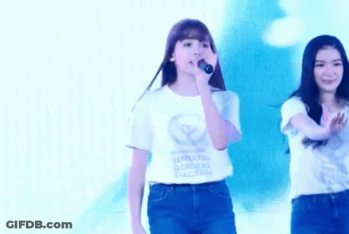 Girl Singing Into Microphone Wearing General Election Shirt GIF