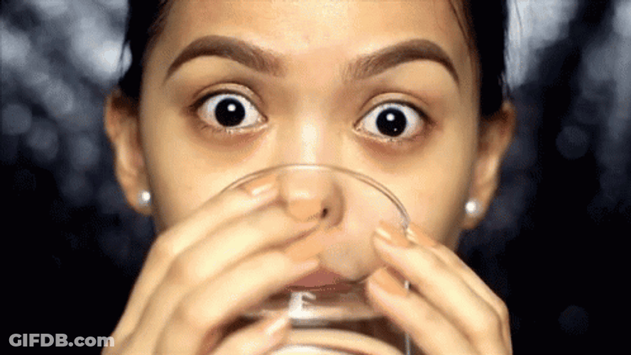 Girl Sips Drinking Water On Glass GIF