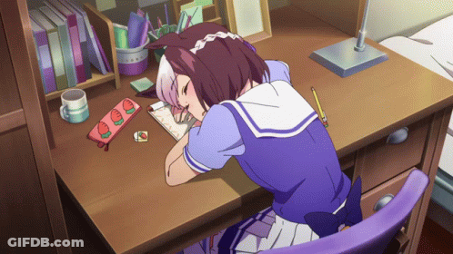 Girl Sitting At Desk With Pencil And Notebook GIF