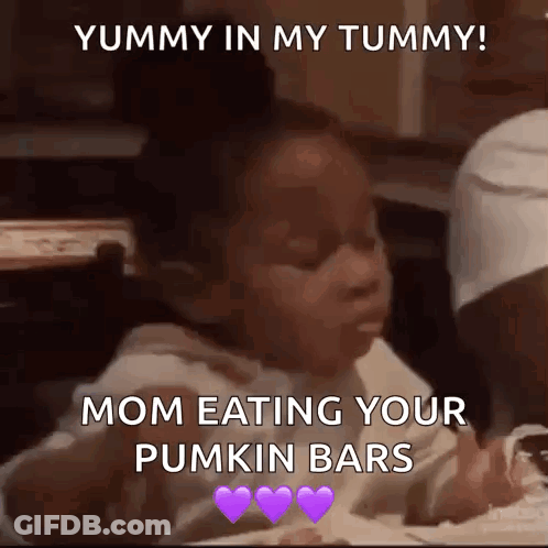 Girl Sitting At Table Eating Pumpkin Bars GIF