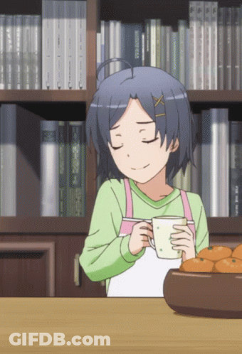 Girl Sitting At Table With Coffee GIF