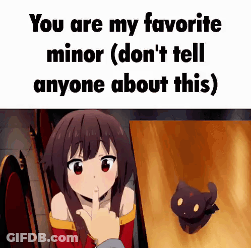 Girl Sitting At Table With Finger On Lips GIF