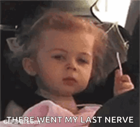 Girl Sitting In Car Seat Holding Lollipop GIF