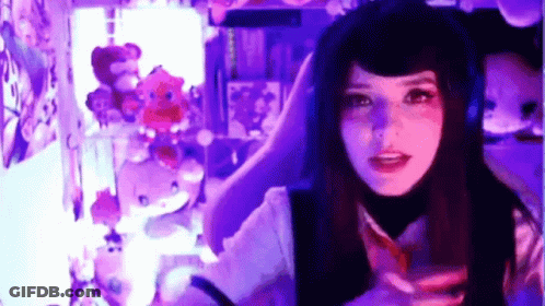Girl Sitting In Chair With Purple Lights GIF