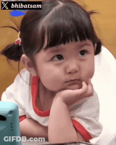 Girl Sitting In High Chair With Sign GIF