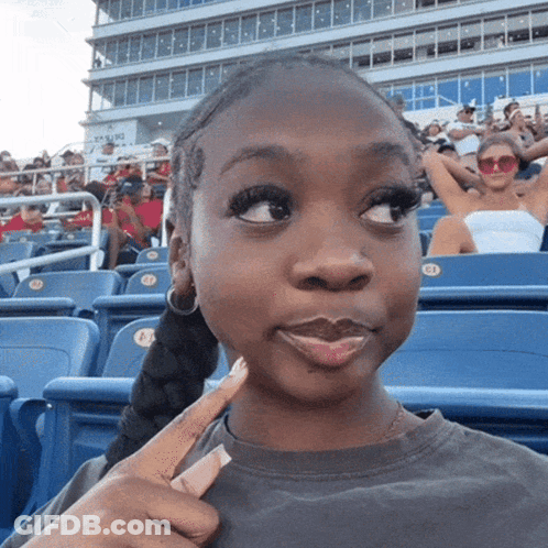 Girl Sitting In Stadium With E1 Sticker GIF