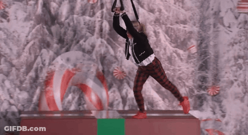Girl Sitting On Bench In Candy Cane Forest GIF