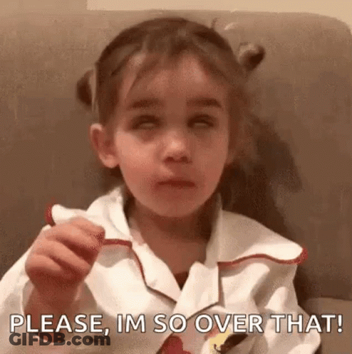 Girl Sitting On Couch Making Funny Face GIF