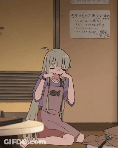 Girl Sitting On Floor With ヤチョカップ Sign GIF