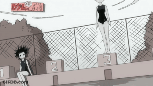 Girl Sitting On Podium With Number 2 And 3 GIF