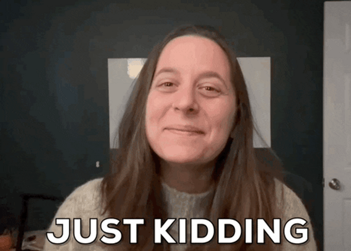 Girl Smiled And Say Just Kidding GIF