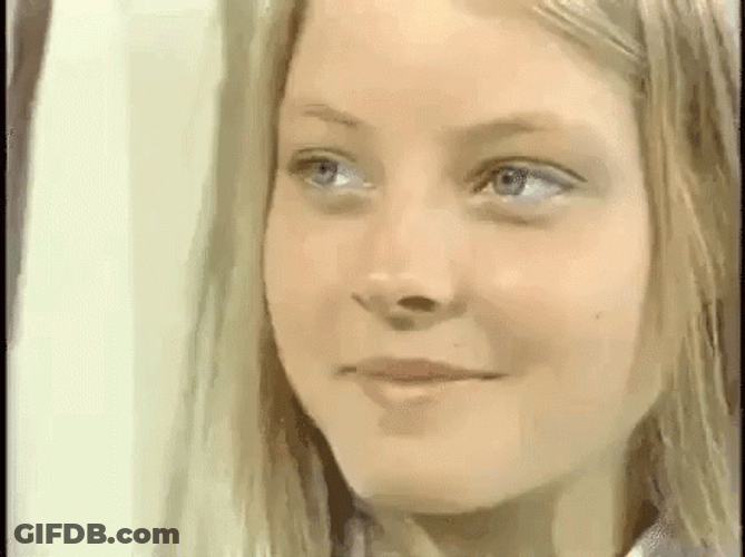 Girl Smiling And Saying Mmm GIF
