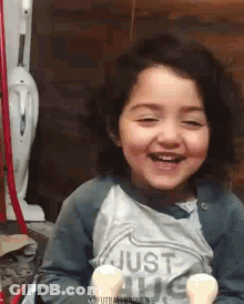 Girl Smiling Holding Two Ice Cream Cones GIF