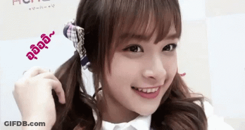 Girl Smiling In White Shirt And Plaid Scarf GIF