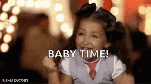Girl Smiling Saying Baby Time With Tie And Bow GIF