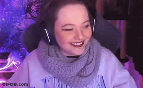 Girl Smiling With Headphones And Scarf GIF