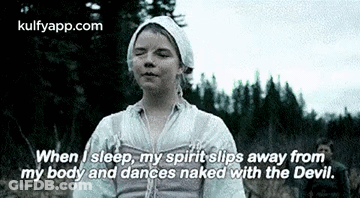 Girl Standing In Field With Eyes Closed GIF