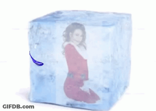 Girl Standing In Front Of Broken Ice Cube GIF