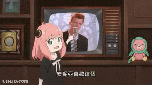 Girl Standing In Front Of TV Holding Cell Phone GIF