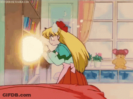 Girl Standing On Bed In Front Of Bookshelf And Window GIF