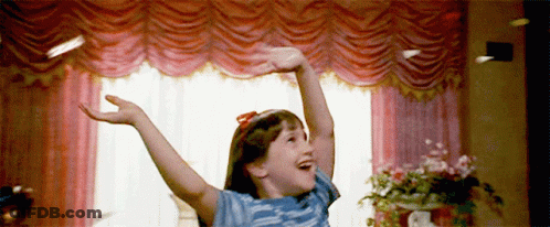 Girl Standing With Arms Outstretched GIF