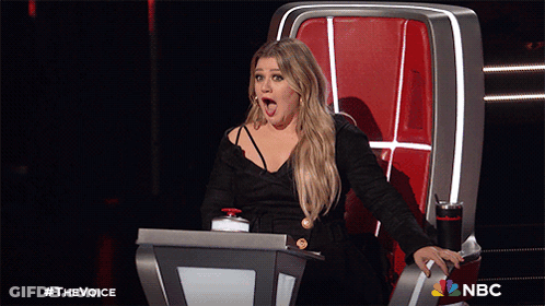 Girl Surrounded By Gummy Bears Saying Game Over GIF