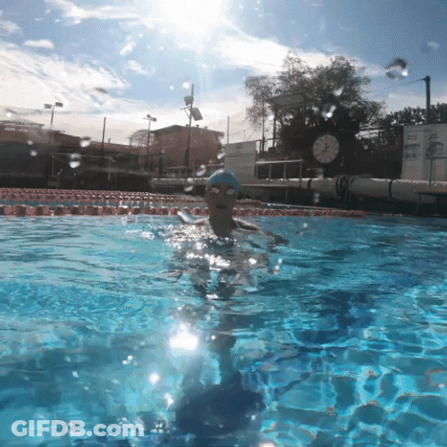 Girl Swimmer Smile And Wave Under The Water GIF