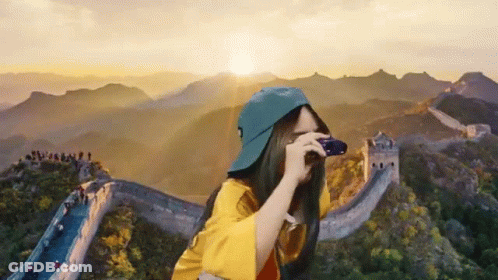 Girl Taking Picture Of Great Wall Of China GIF