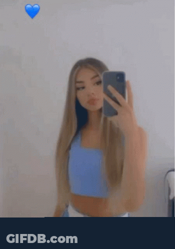 Girl Taking Selfie In Mirror GIF
