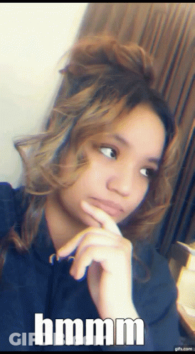 Girl Taking Selfie Saying Hmmm GIF