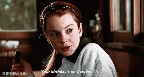 Girl Talking On Cell Phone Saying Your Birthday's On October 11Th GIF
