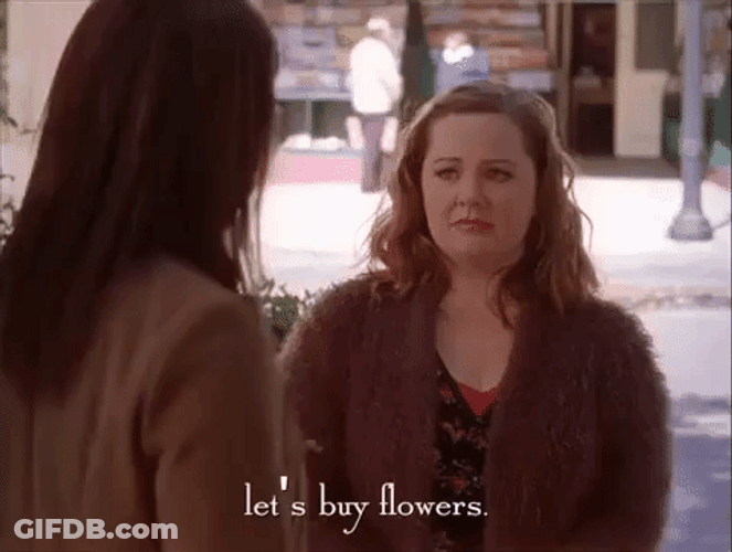 Girl Thinking To Giving Flowers GIF