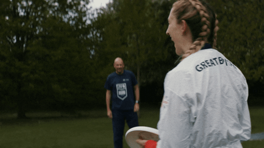 Girl Throwing Frisbee GIF