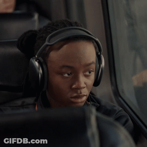 Girl Travelling With Headphones GIF