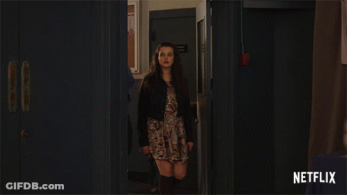 Girl Walking Down Hallway With Netflix GIF