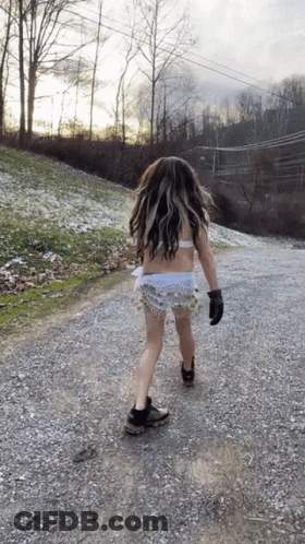 Girl Walking Gravel Road In Bikini GIF