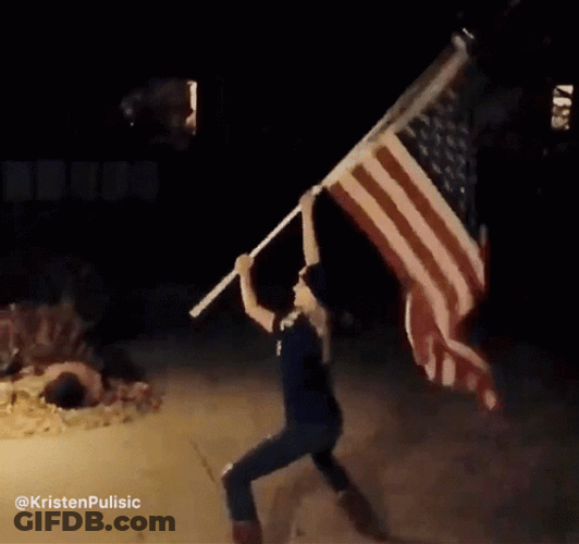 Girl Waving American Flag GIF