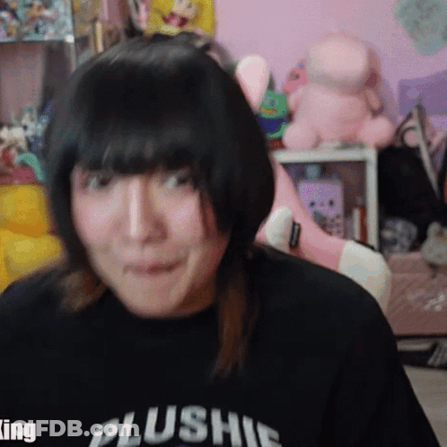 Girl Wearing Black Plushie Shirt GIF