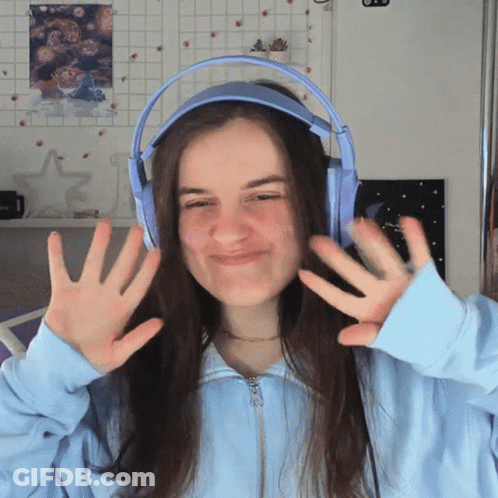 Girl Wearing Blue Headphones Making Face GIF