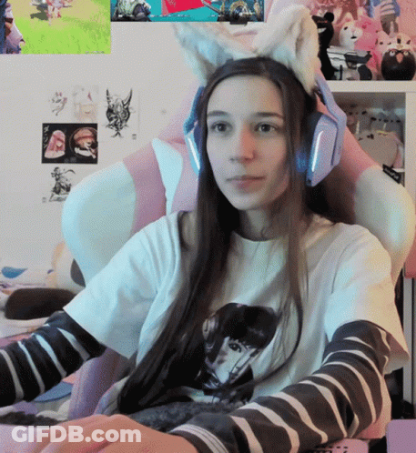 Girl Wearing Cat Ear Headband GIF