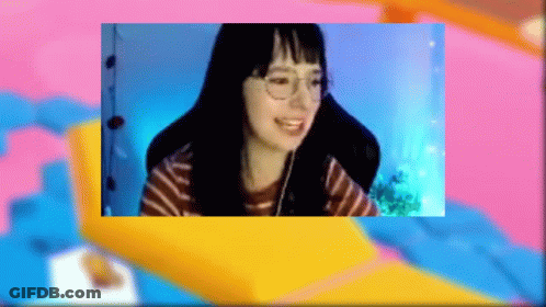 Girl Wearing Glasses And Headphones Smiling GIF