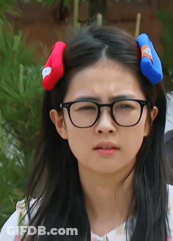 Girl Wearing Glasses And Red Blue Headband GIF