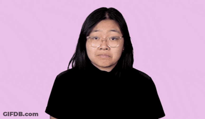 Girl Wearing Glasses Shrugs GIF