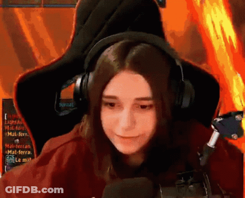 Girl Wearing Headphones Sitting In Chair GIF