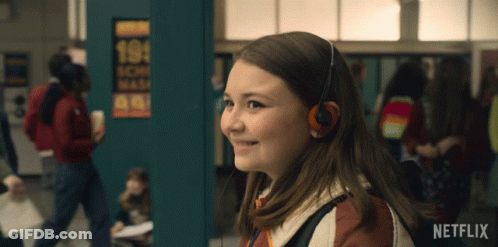 Girl Wearing Headphones Smiling GIF