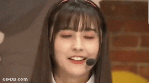 Girl Wearing Headset With Chinese Writing GIF