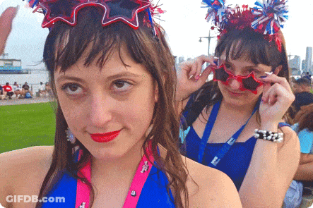 Girl Wearing Lanyard Saying I'm A Girl GIF